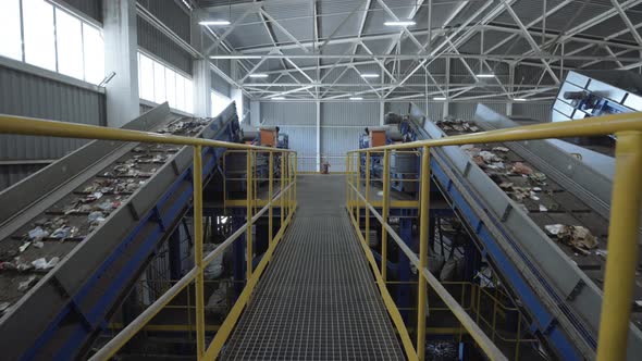 Waste Sorting Plant Conveyors Filled with Various Household Waste