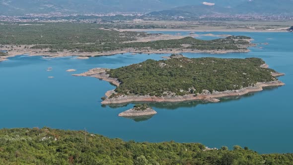 Panoramic View of a Large Blue Lake with Islands in Montenegro