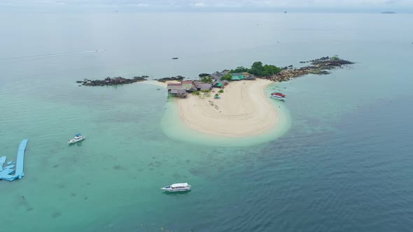 Aerial view drone video of Amazing small island beautiful tropical sandy beach landscape view