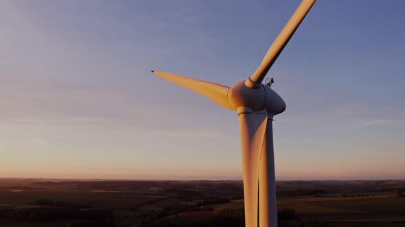 Horizontal Panning From a Drone View of a Wind Farm Among Fields