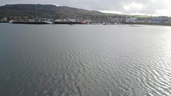 Skimming over the loch towards Campbeltown marina and old quay