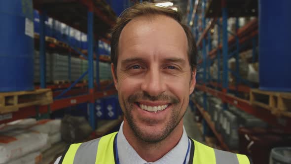 Portrait of male manager in a warehouse