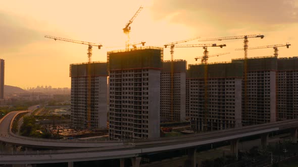 Aerial of construction site at sunset