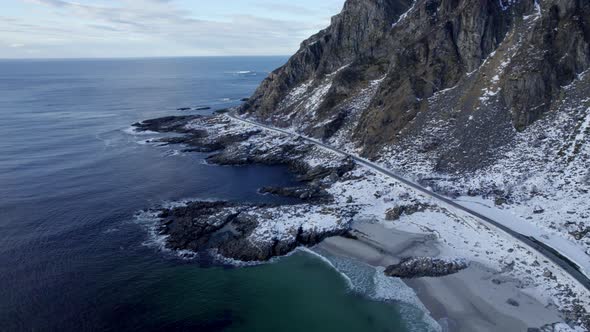 Amazing aerial shot of the Scenic Route Andøya along the Norwegian Sea, with rocky cliffs and coastl