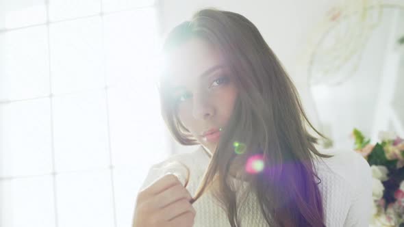 Young Beautiful Girl in White Decor