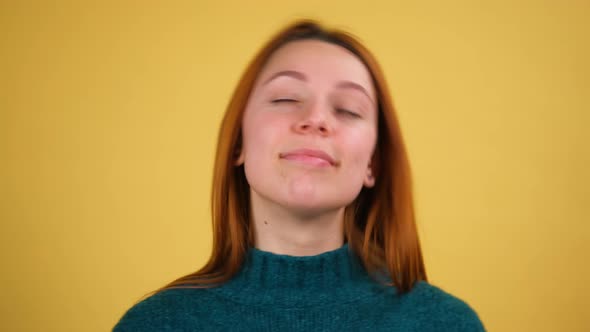 Close Up Happy Young Woman Dancing Over Yellow Background Isolated