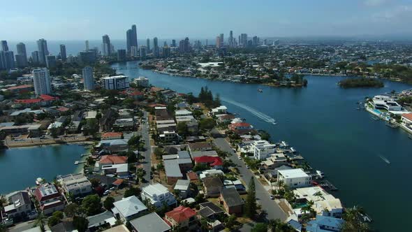 Aerial drone footage of Surfers Paradise  panning downwards looking towards Broadbeach revealing  ma