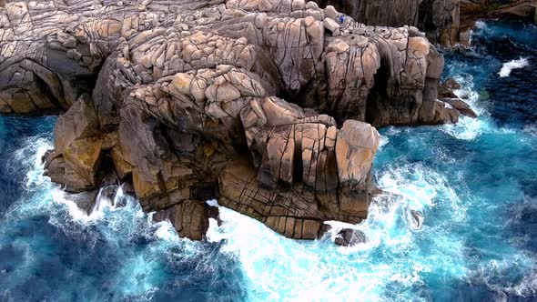 Aerial shot of beautiful rock formation called paper cliffs, in Morás, Xove, Lugo, Galicia, Spain at