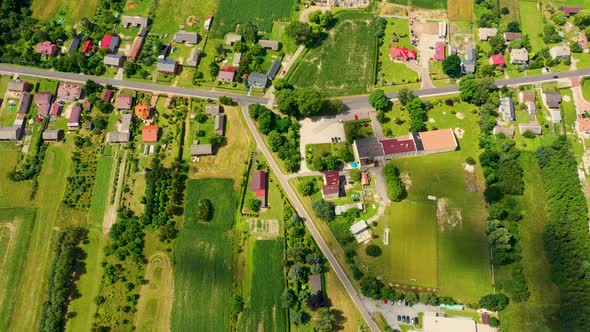 Aerial view of a small village in summer day. Concept of leave the village and desolate location