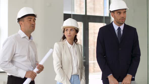 Architect or Realtor Showing Office To Customers 