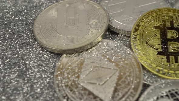 Cryptocurrencies Lie on Silver Sequins