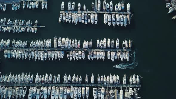 Aerial Top View of Marina and Many Yacht Parked at Scaffolding