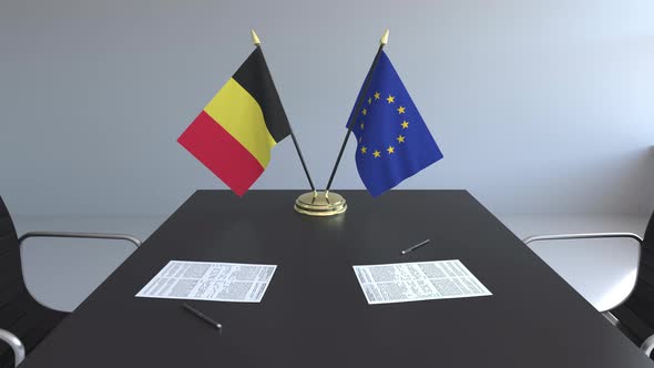 Flags of Belgium and the European Union and Papers