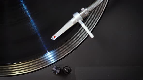 Top View on Black Modern Turntable with LP Record