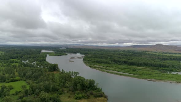 River under Storm Clouds