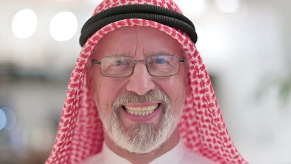 Close Up of Senior Old Arab Man Smiling at the Camera 