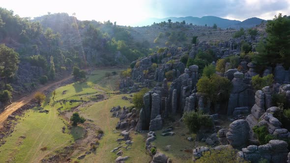 Scenic Landscape with Beautiful Rock Formations in Mountain Valley