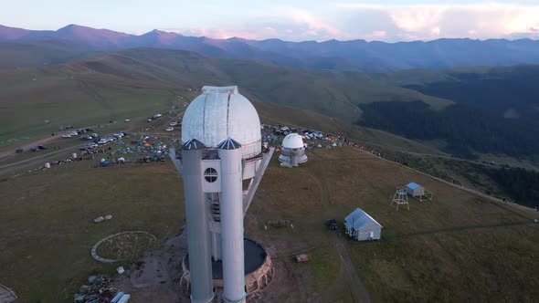 Two Large Telescope Domes at Sunset