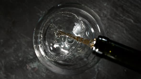 Super Slow Motion Shot of Pouring White Wine Into Glass at 1000Fps