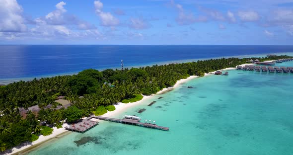 Natural birds eye abstract shot of a white paradise beach and aqua turquoise water background in col