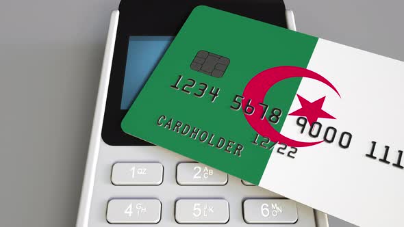 Credit Card with Flag of Algeria and POS Terminal