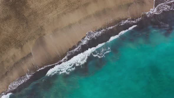 Top View of the Desert Beach on the Atlantic Ocean. Coast of the Island of Tenerife. Aerial Drone