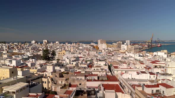 Aerial panorama over Cadiz city in Spain with whitewashed houses