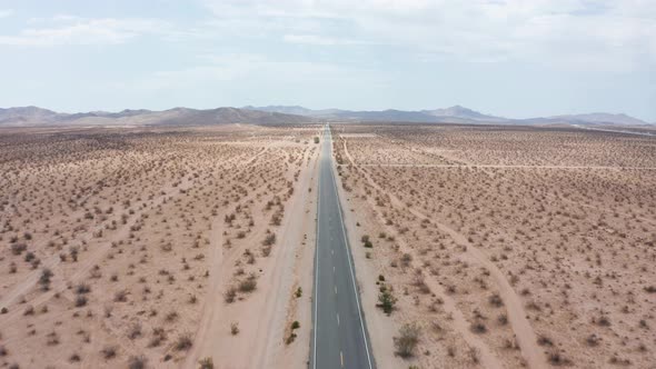 Desert road. Aerial point of view over road in desert. 