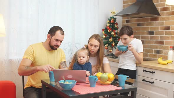 Happy Lovely Family Have Breakfast Together at Home