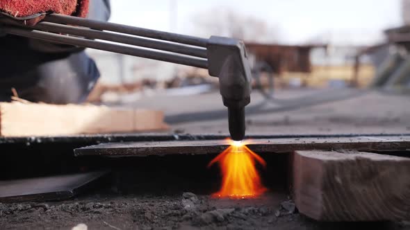 gas cutting of metal, sparks fly