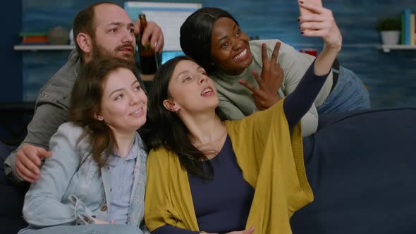 Multiracial Friends Taking Sefie Together Using Smartphone Posting on Social Media