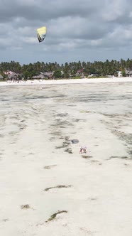 Tanzania  Vertical Video Kitesurfing Near the Shore of Zanzibar Slow Motion