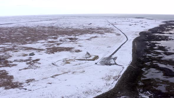 Lonely Church in Snowy Iceland on the Coast