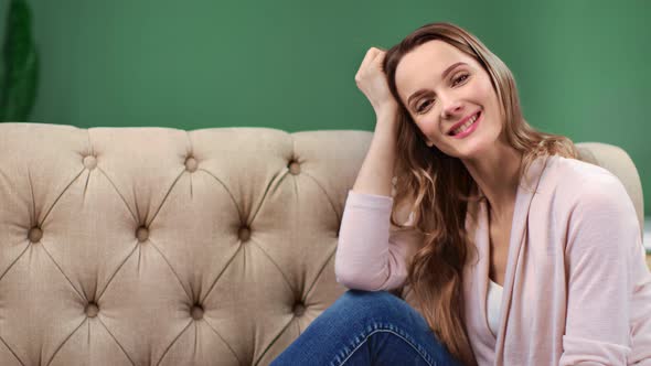 Portrait Lady with Natural Beauty and Pretty Smile Relaxing at Home