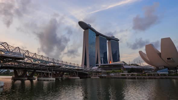 4k night to day Time-lapse of view of cityscape of Singapore city at sunrise