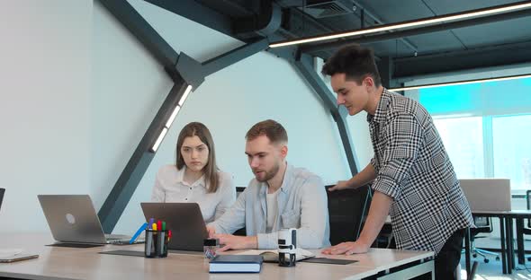 Business People are Discussing a Work Plan at a Planning Meeting