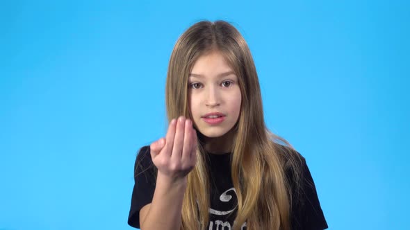 Girl Smiling, Waving Her Hand Saying Hello and Calling Someone