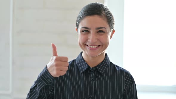 Positive Young Indian Woman Doing Thumbs Up 