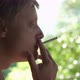 Young Man Smoking Cigarette Outoors - VideoHive Item for Sale