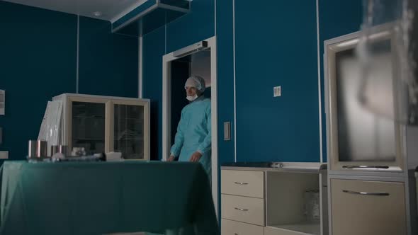 Two Specialist Surgeons Entering the Operating Room