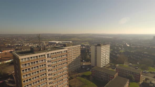 Aerial footage view of high rise tower blocks, flats built in the city of Stoke on Trent to accommod