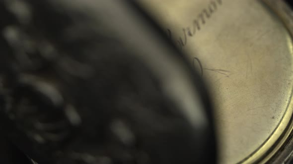 Vintage Clock Rotate on Them Close-up Engraving