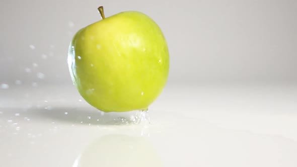 Green Apple Fall on White Surface