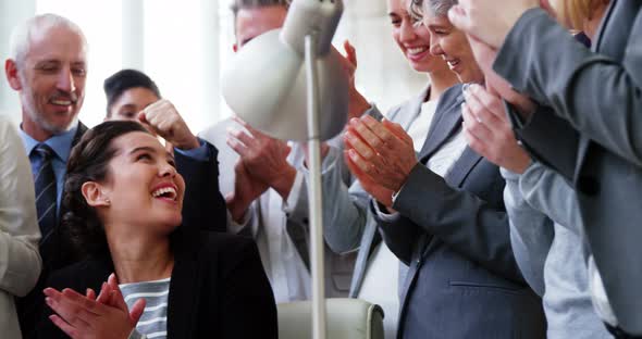 Group of business people appreciating their colleagues works