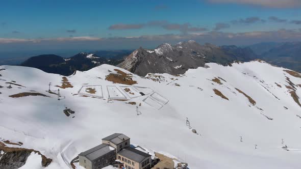 Aerial Drone View on Snowy Peaks of Swiss Alps. Switzerland. Rochers-de-Naye Mountain Peak.