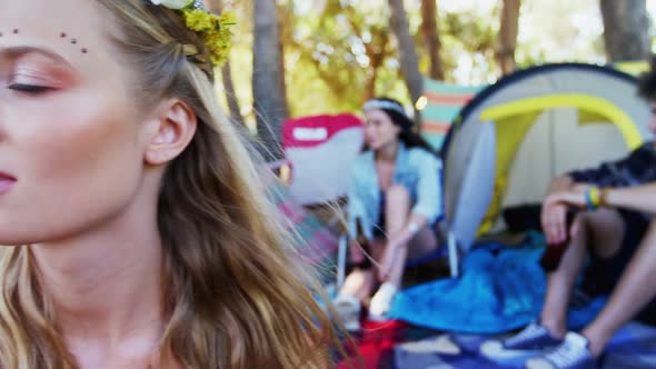 Woman having glass of beer at music festival 4k