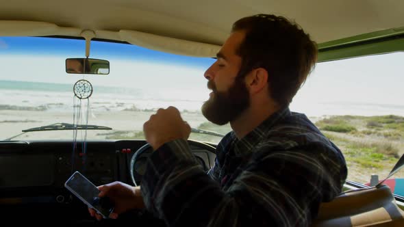 Young couple interacting with each other in the van 4k