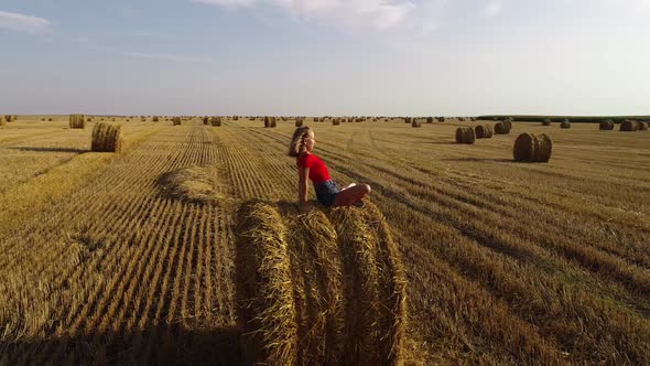 Girl On Hay Bales