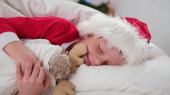 Child Sleeping Before Christmas