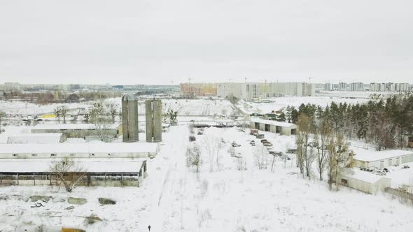 View From a Drone To an Abandoned Snowcovered Vehicle Fleet of Technical Vehicles